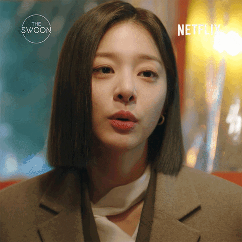 TV gif. Seol In Ah as Young Seo in Business Proposal. She looks cutely at us as she holds one finger up and says, "Just one more drink," and pouts at the end.