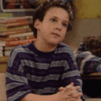 TV gif. Ben Savage as Cory in Boy Meets World. He's sitting at a desk with his hands folded and his lips pursed in agreement. He nods his head slowly, comprehending and agreeing.