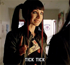 Movie gif. Ksenia Solo as Kenzi in Time Bomb looks wide-eyed and gestures an explosion with her hands as she says, "Tick tick, boooooom, time bomb," which appears as text.