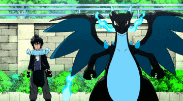 Pokemon gif. Trainer Alan stands next to his Mega Charizard X, who glares at us while breathing blue fire.