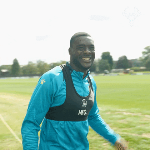 Sports gif. Video of Ken Sema, a soccer player, walking towards us on a field with a teal jersey, beating his chest twice with a smile, then walking away with his arms out. Text, "Hey, come on. You know already."