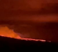 Mauna Loa Eruption Casts Red Glow Over Hawaii Night Sky