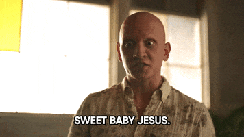 TV gif. Anthony Carrigan as NoHo Hank in Barry takes a step back, wide-eyed with concern, saying "Sweet baby Jesus," which appears as text.