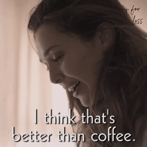 TV gif. Elizabeth Olsen as Leigh Shaw in Sorry For Your Loss looks down in side profile, a slight smile on her face, soft sunlight pouring through a window behind her. Text, "I think that's better than coffee."