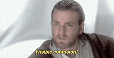 Star Wars gif. Ewan McGregor straightens up and blinks, looking uncertain. Subtitle text indicates tone, "[visible confusion]."