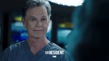 the resident wink GIF