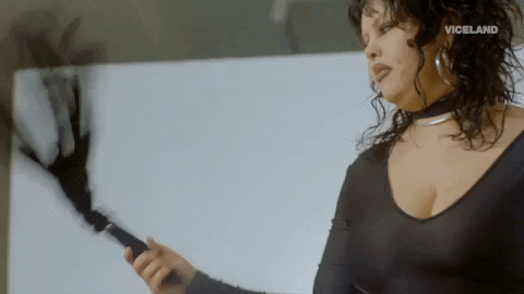 bdsm whip GIF by HOLLYWOOD LOVE STORY - Person twirling flogger in hand