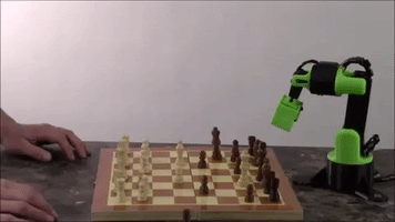 slantconcepts robot chess chess robot robot playing chess GIF