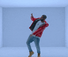 Music video gif. From Hotline Bling, Drake rolls and sways, dancing to himself.