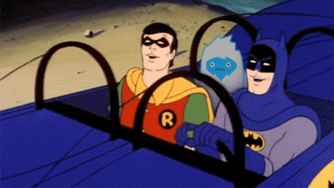 Cartoon gif. Batman and Robin from the original cartoon sit in the Batmobile smiling and nodding. There’s a small yeti in the back seat that stares dead eyed. 
