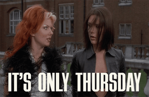 Celebrity gif. Ginger Spice and Posh Spice look at each other before turning to glare past us. Text, "It's only Thursday."