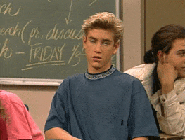 TV gif. Mark-Paul Gosselaar as Zack Morris in Saved by the Bell sits in class and doesn't bother to hide his boredom as he rolls his eyes to the back of his head.
