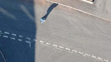 Skateboarding Drone GIF