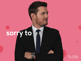 Ad gif. Singer Michael Bublé stands, arms crossed against a pink Bubly background. He turns to look at the camera and gives us a wink. Little twinkle stars appear by his eye. Text reads, “Sorry to burst your…bublé.”
