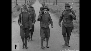 marching silent film GIF