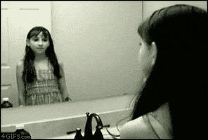 girl mirror GIF