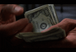 Hands counting out cash before deciding on a subscription