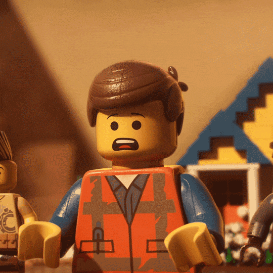 Movie gif. Emmet in the Lego Movie squints his eyes angrily as he shakes and shimmies his shoulders. 