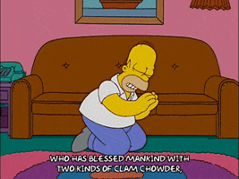 The Simpsons gif. Homer kneeling and praying in front of a couch. Text, "who has blessed mankind with two kinds of clam chowder."