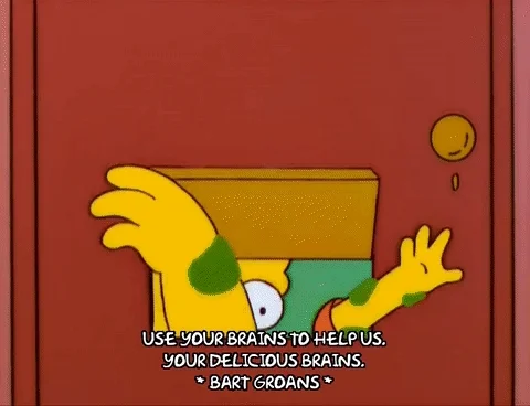 grabbing homer simpson GIF