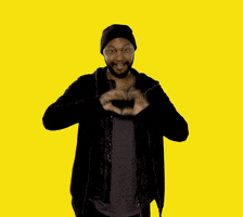 Video gif. Man does one big jazz hand and as he opens his hands, text that reads, "You're cool," comes flying out.