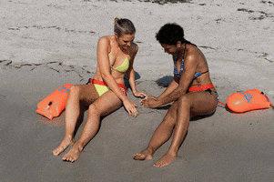 NewWaveSwimBuoy building sand castles with new wave swim buoy GIF