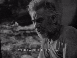 Movie gif. Humphrey Bogart as Dobbs in The Treasure of the Sierra Madre wearily crouches saying, "We got work to do tomorrow."