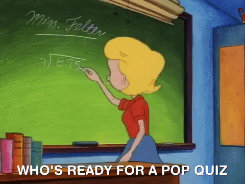 Pohyblivá animace s učitelkou píšící na tabuli a s nápisem "Who´s ready for a pop quiz". 