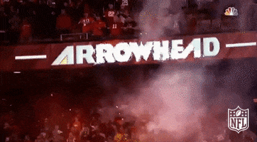 Sports gif. Stadium for the Kansas City Chiefs showing the Arrowhead sponsorship and flames exploding from the bottom during celebration.