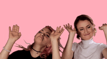 Celebrity gif. Rena and Nia Lovelis from the band Hey Violet dancing and raising the roof.