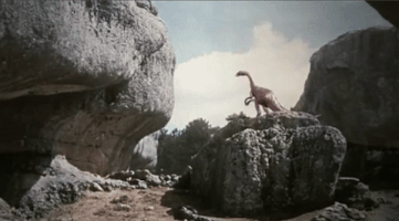 sci fi dinosaur GIF by Warner Archive