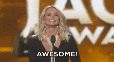 Celebrity gif. A smiling Miranda Lambert stands on the stage of the Academy of Country Music Awards and says, “Awesome!”