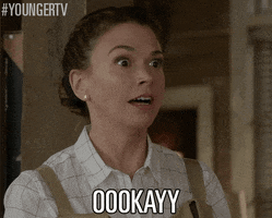 TV gif. Sutton Foster as Liza in Younger has wide eyes as she says with reluctance, the text that reads, "Okay."