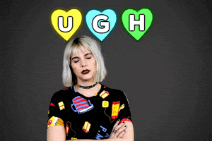 Video gif. Goth-looking girl with crossed arms huffs and frowns, and illustrated daggers fly out from her eyes. Text encircled by hearts flashes above her, "Ugh."
