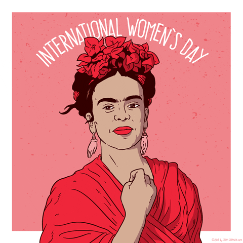 Illustrated gif. Frida Kahlo wears a red shawl and red flowers in her hair. She smiles at us and holds her shawl closed at her chest. Text, “International Women’s Day.”