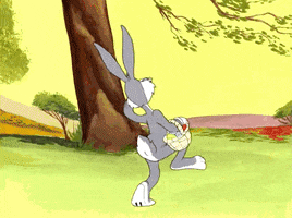 TV gif. Bugs Bunny skips across a field with an Easter basket in his hand. He has a big smile on his arm is waving back and forth like a ballet dancer. 