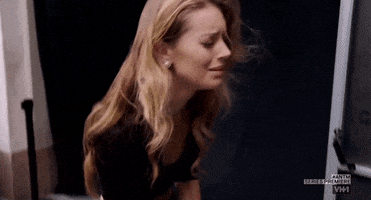 Reality TV gif. A contestant on America's Next Top Model is totally distraught as she cries and clutches her hair.