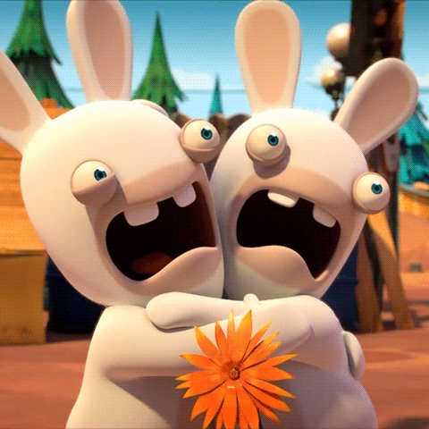 Video game gif. Two rabbit like creatures from Mario plus Rabbids clutch each other closely as they scream with open mouths and bulging eyes. 