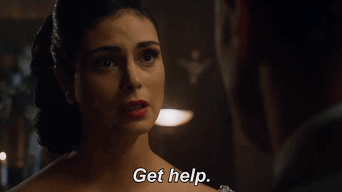 Gif of a woman saying "get help"