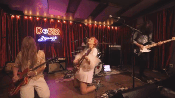 highwaisted guitar rock n roll shred feather GIF