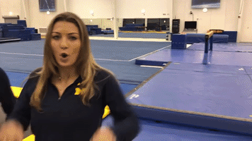 michigan women's gymnastics rings GIF by Michigan Athletics