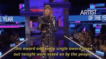 taylor swift this award and every single award given out tonight were voted on by the people GIF