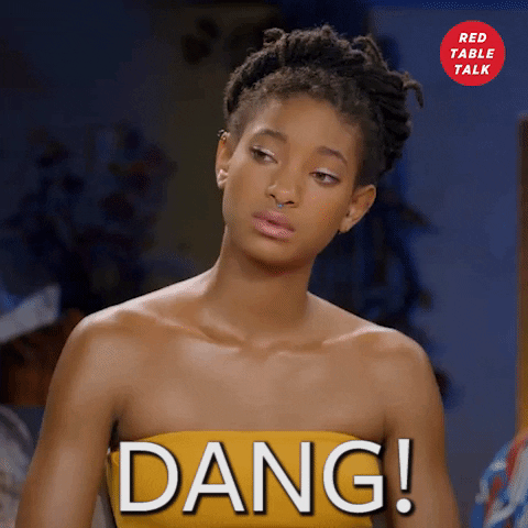 Celebrity gif. Willow Smith looks over at someone and winces sympathetically in reaction to someone speaking.