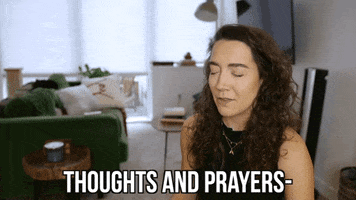 Video gif. Alayna Joy closes her eyes as she tilts her head back and says, "Prayers, all thoughts and prayers."