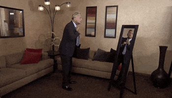 Tying Suit And Tie GIF by Wheel of Fortune