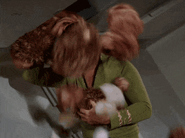 star trek kirk gets shitted on by tribbles GIF