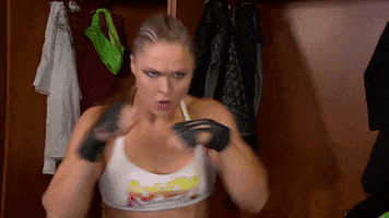 Ronda Rousey Fighting GIF by WWE