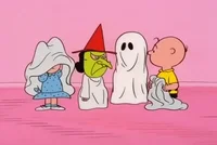 Sally struggles to put on her ghost costume