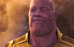 Celebrity gif. Kenan Thompson's doubting face superimposed over an image of Thanos from the Avengers.