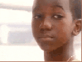 Video gif. A sad boy looks down as a single tear rolls down his face. He turns away.